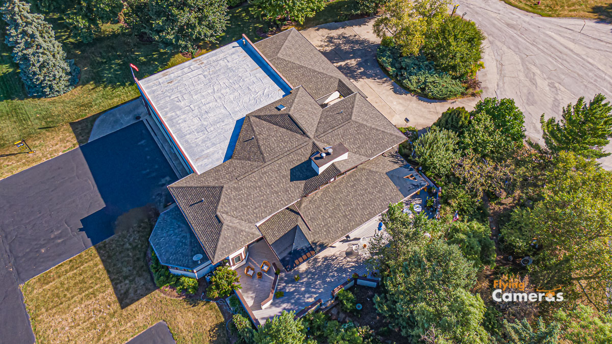 Aerial drone view of a homes new roof with roof venting