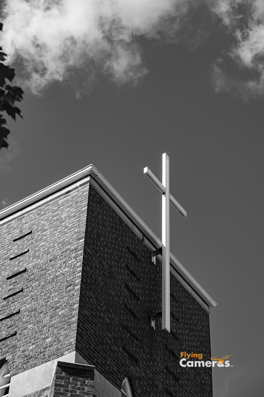 Black and white photo of church steeple in Downers Grove