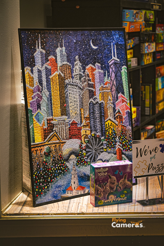 Very colorful holiday puzzle of Chicago buildings set in a store front window