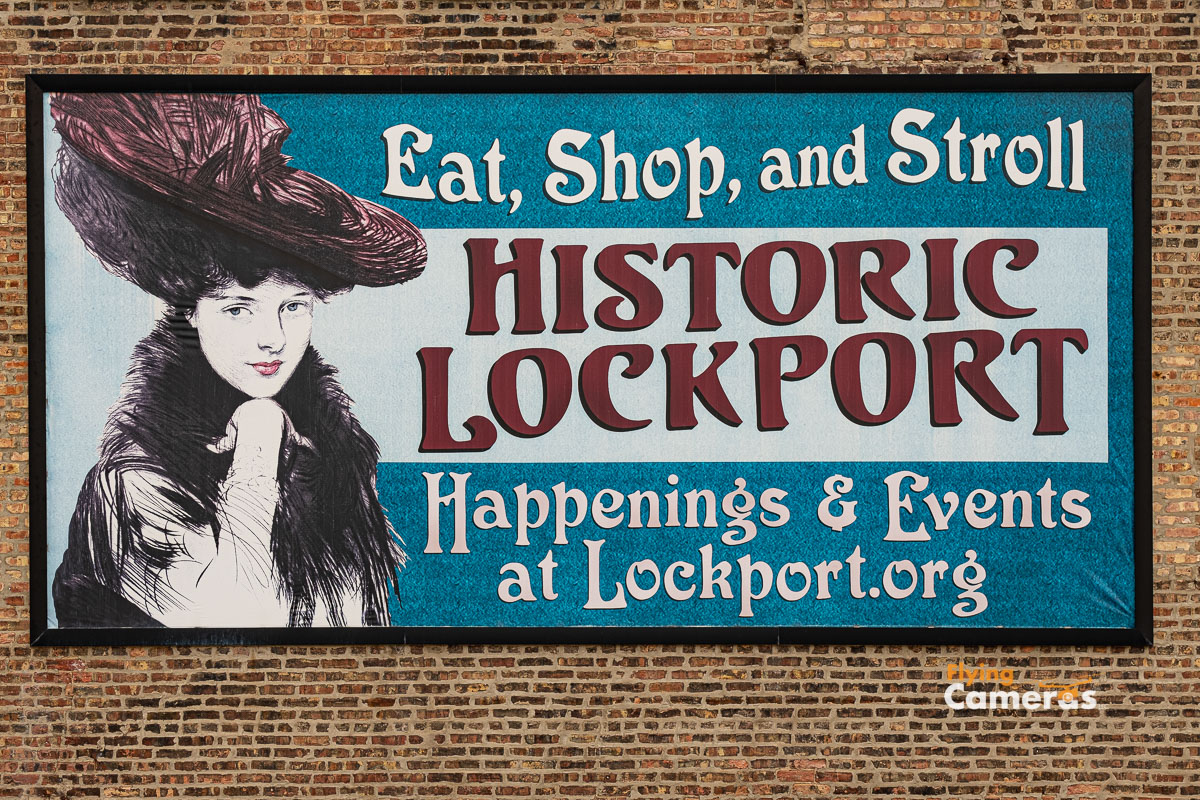 Colorful sign extolling Lockport as a destination