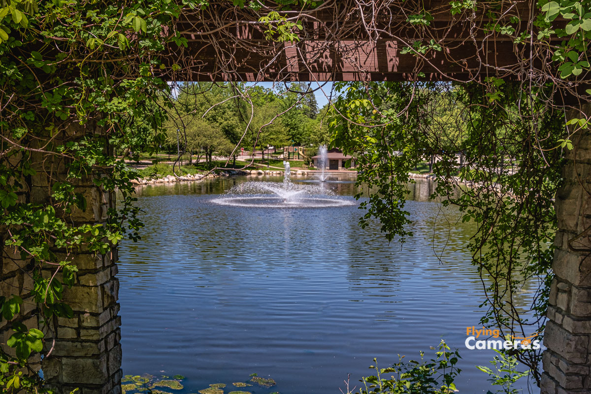 Prince Pond in Downers Grove visible through landscape arbor